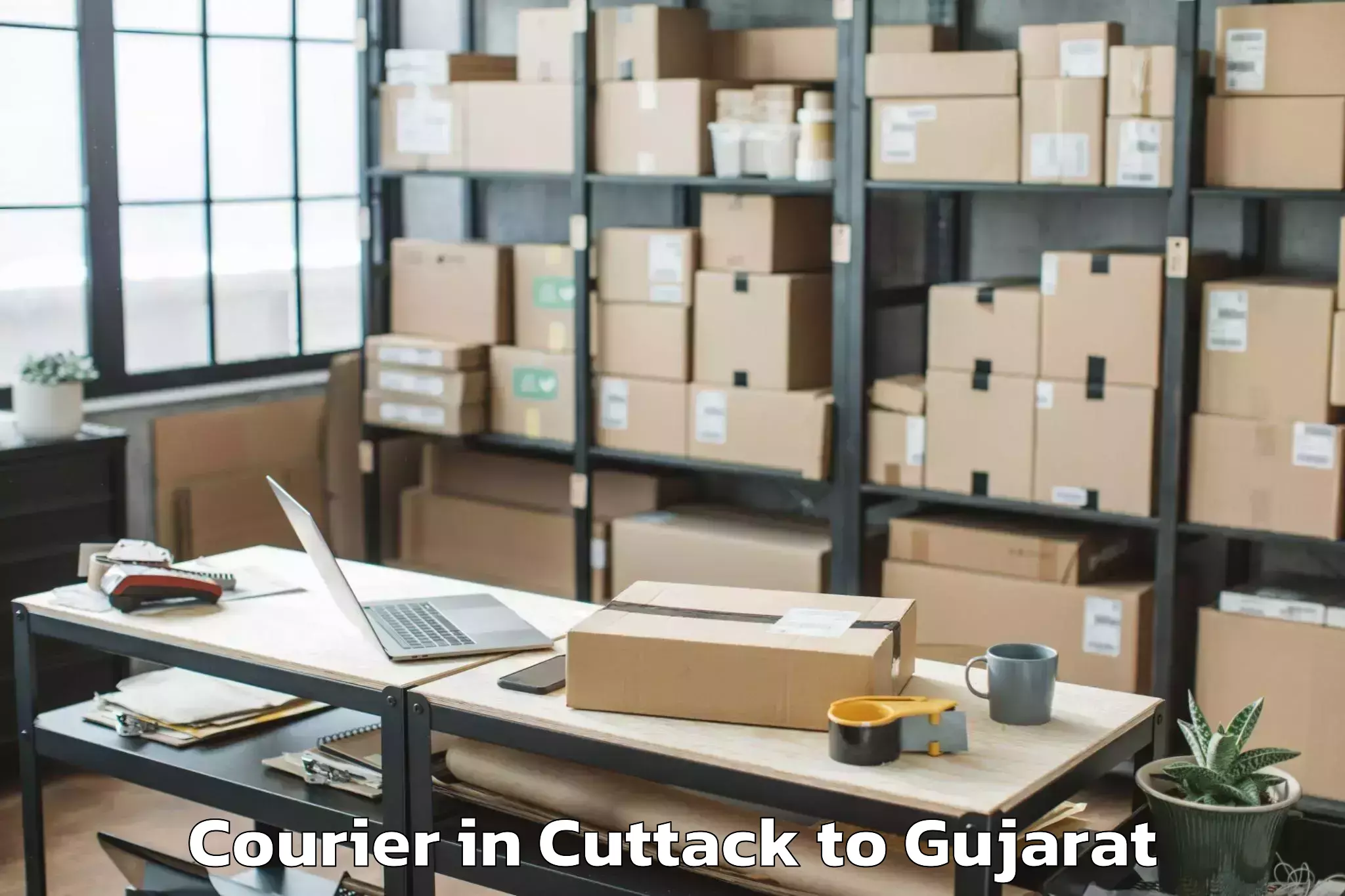 Cuttack to Vaghodia Ina Courier